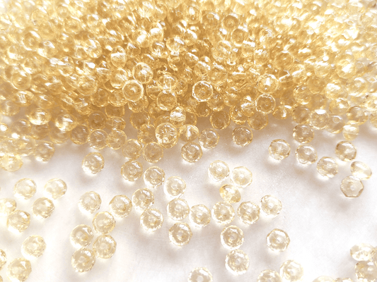 Faceted rondelle beads 3x5mm - light yellow