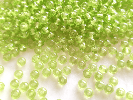 Faceted rondelle beads 3x5mm - light green