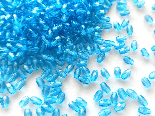 Faceted olive beads 4x6mm - Caribbean blue