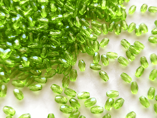 Faceted olive beads 4x6mm - warm green