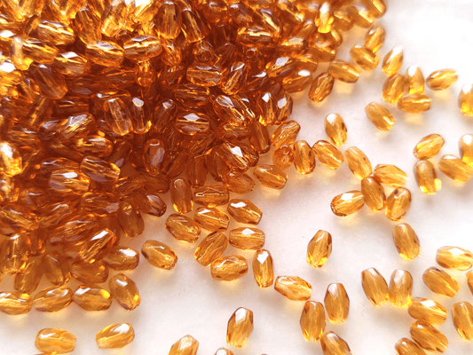 Faceted olive beads 4x6mm - warm orange