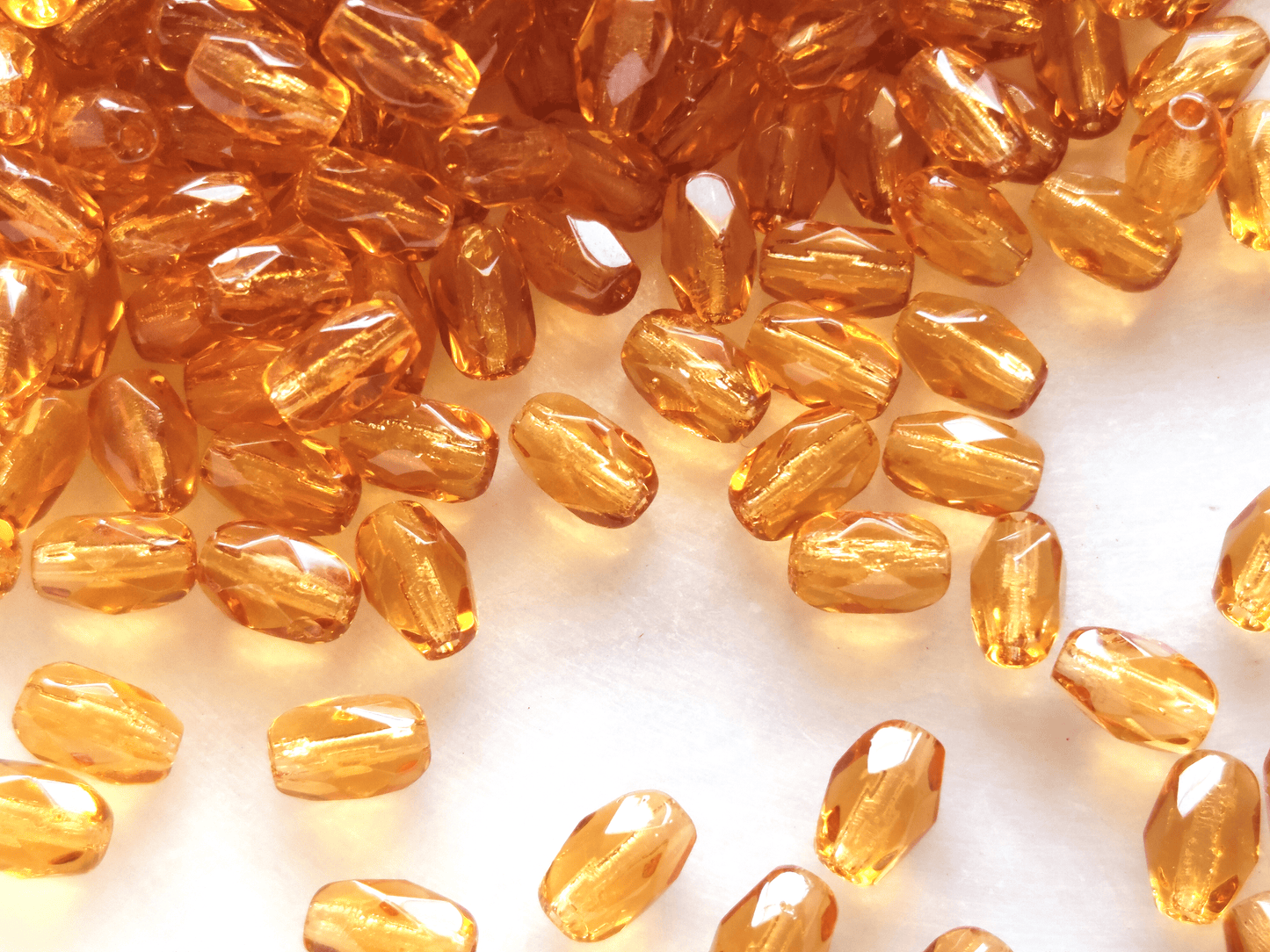 Faceted olive beads 4x6mm - warm orange