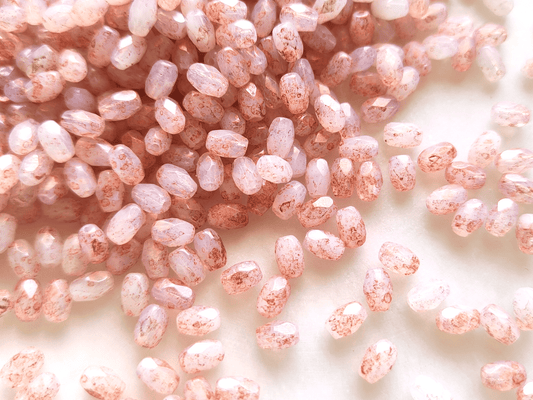 Faceted olive beads 4x6mm - white & copper