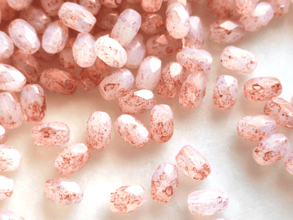 Faceted olive beads 4x6mm - white & copper