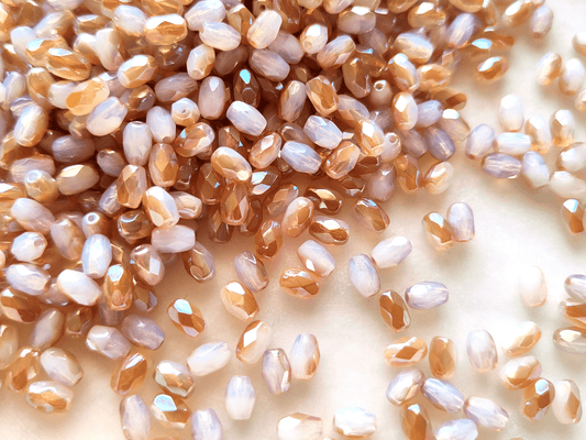 Faceted olive beads 4x6mm - white & brown