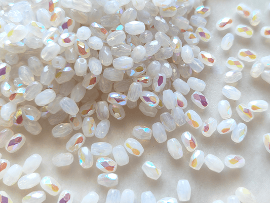 Faceted olive beads 4x6mm - white iris