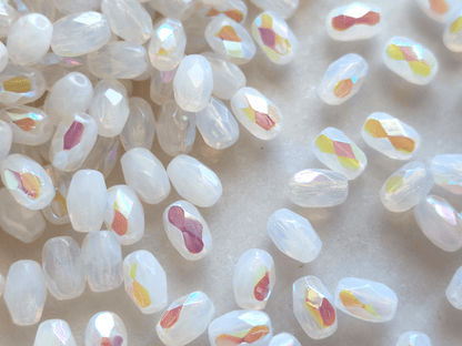 Faceted olive beads 4x6mm - white iris