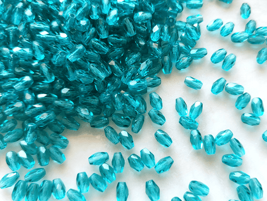Faceted olive beads 4x6mm - turquoise