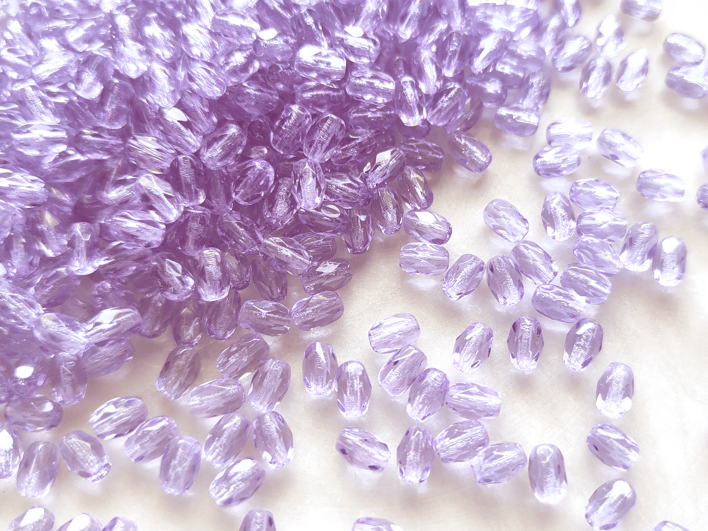 Faceted olive beads 4x6mm - lavender