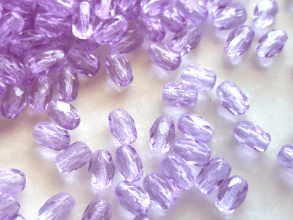 Faceted olive beads 4x6mm - lavender