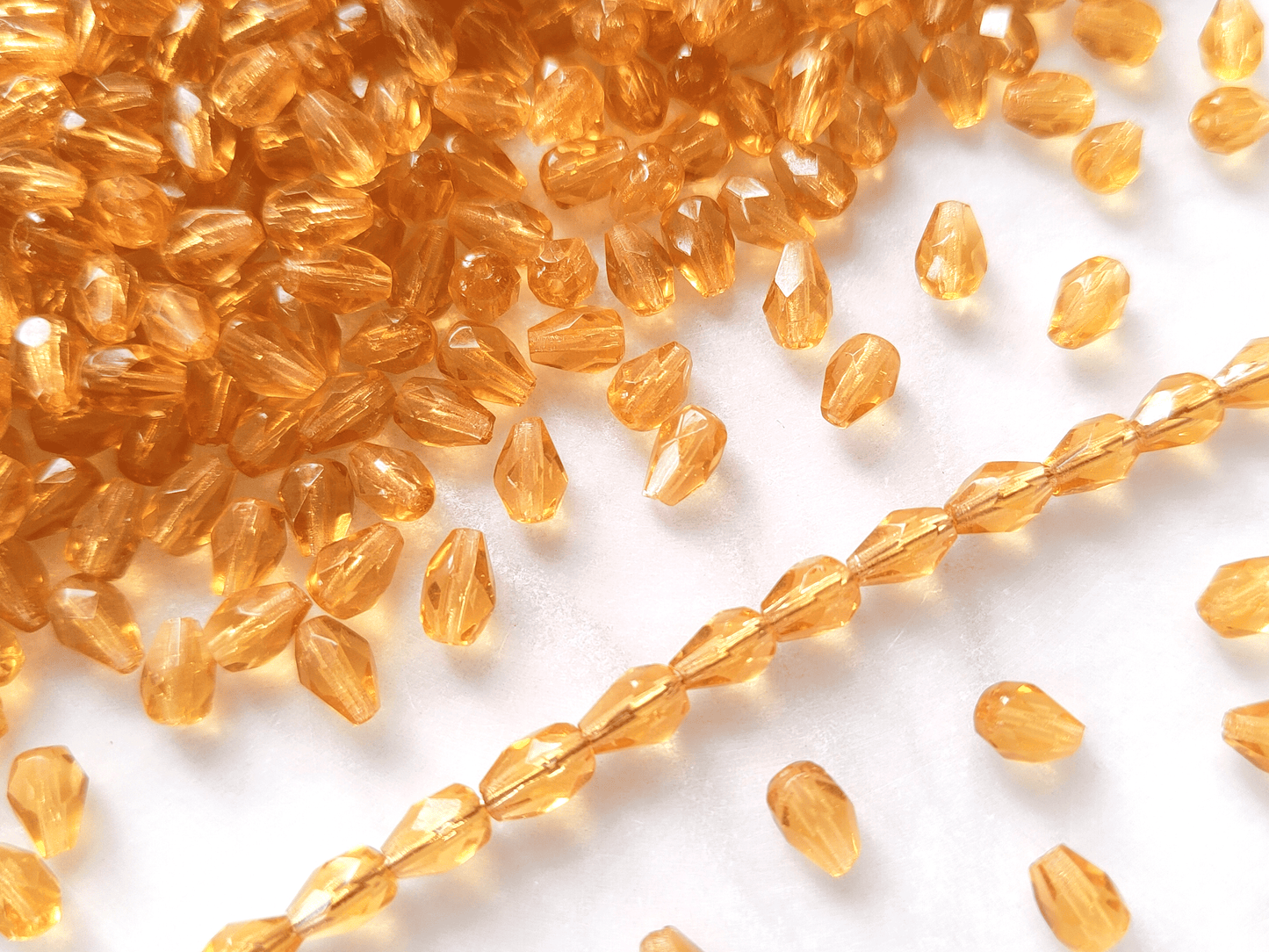 Fire-polished drop beads 7x5mm - honey