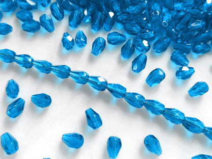 Glasschliff-Tropfen 7x5mm - dunkles Karibikblau