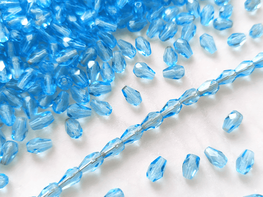 Fire-polished drop beads 7x5mm - light blue