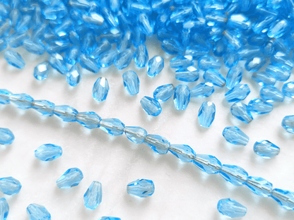 Fire-polished drop beads 7x5mm - light blue