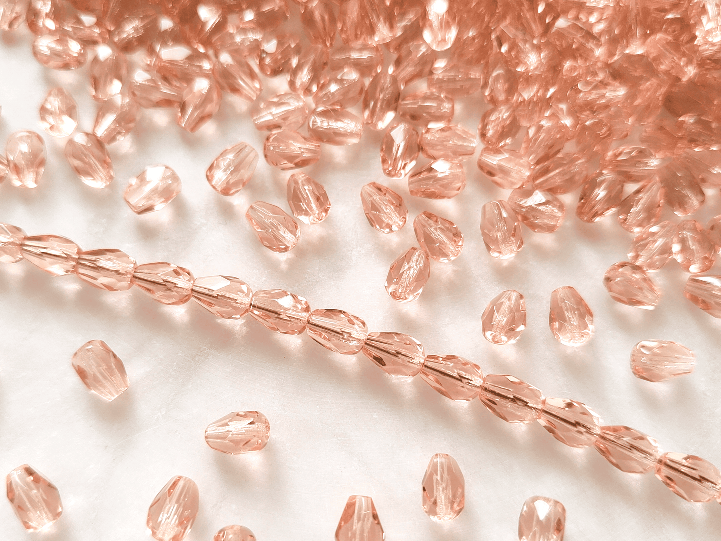 Fire-polished drop beads 7x5mm - salmon
