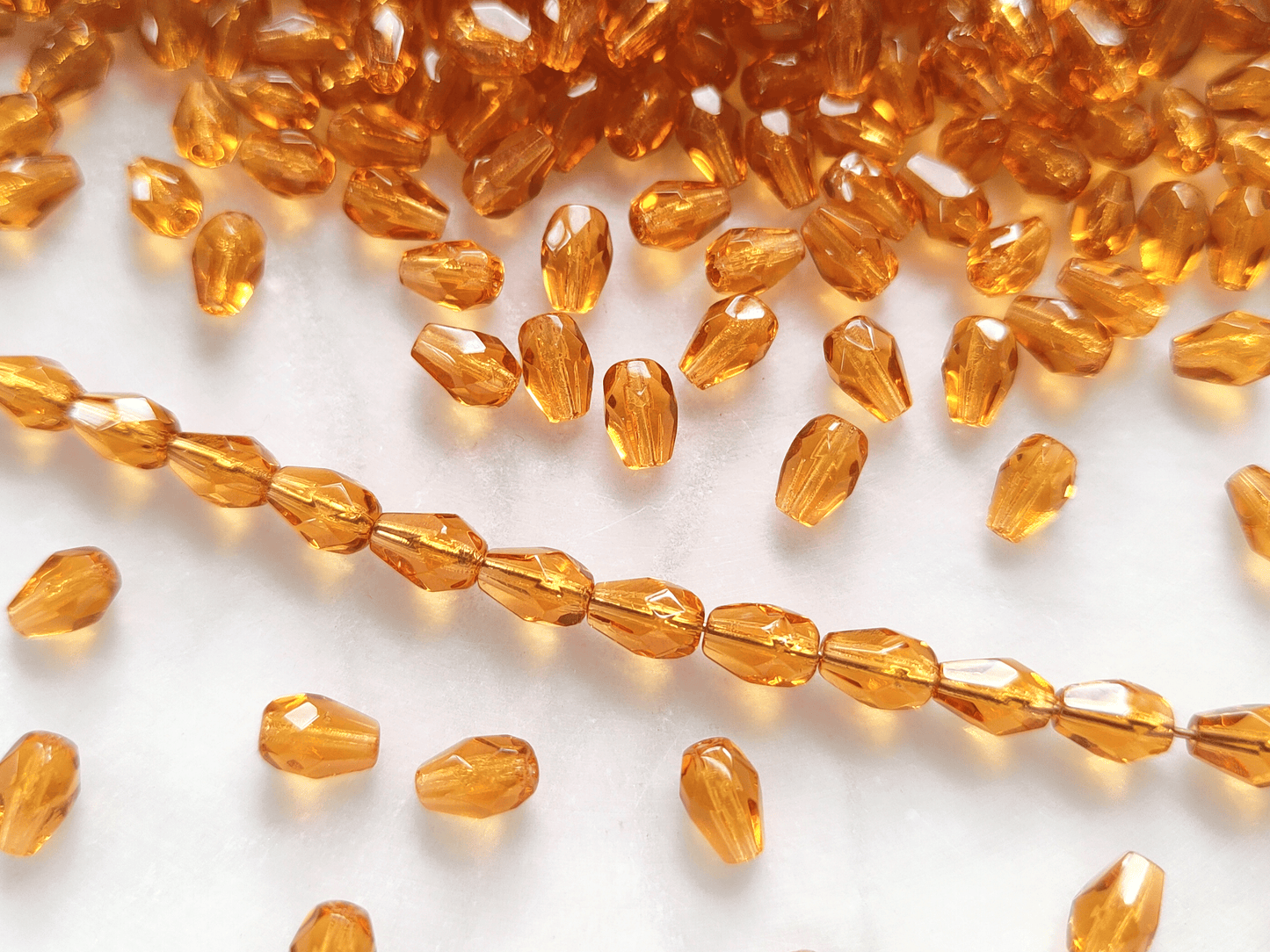 Fire-polished drop beads 7x5mm - amber