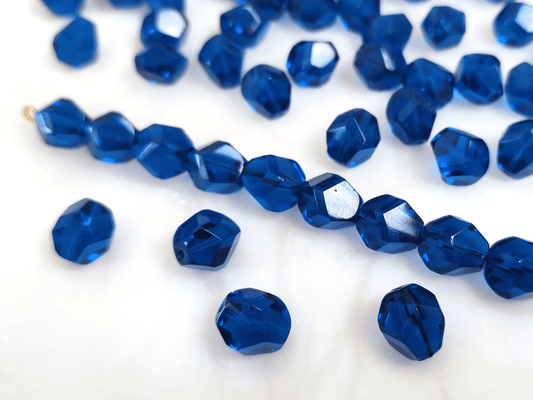 Faceted nugget beads 10x9mm - dark Caribbean blue