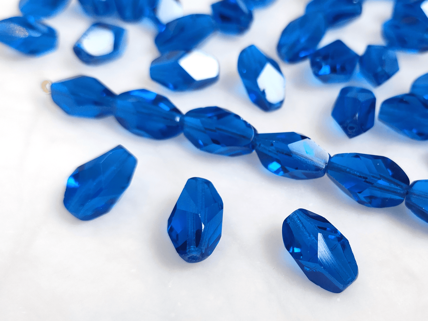 Faceted nugget beads 15x10mm - dark Caribbean blue