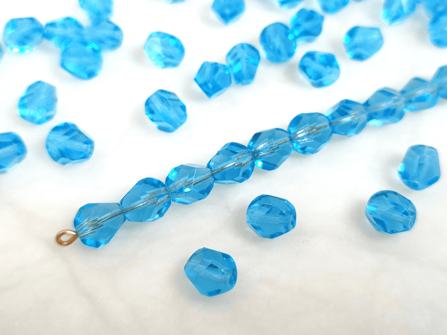 Facettierte Nuggets 8x6mm - Karibikblau