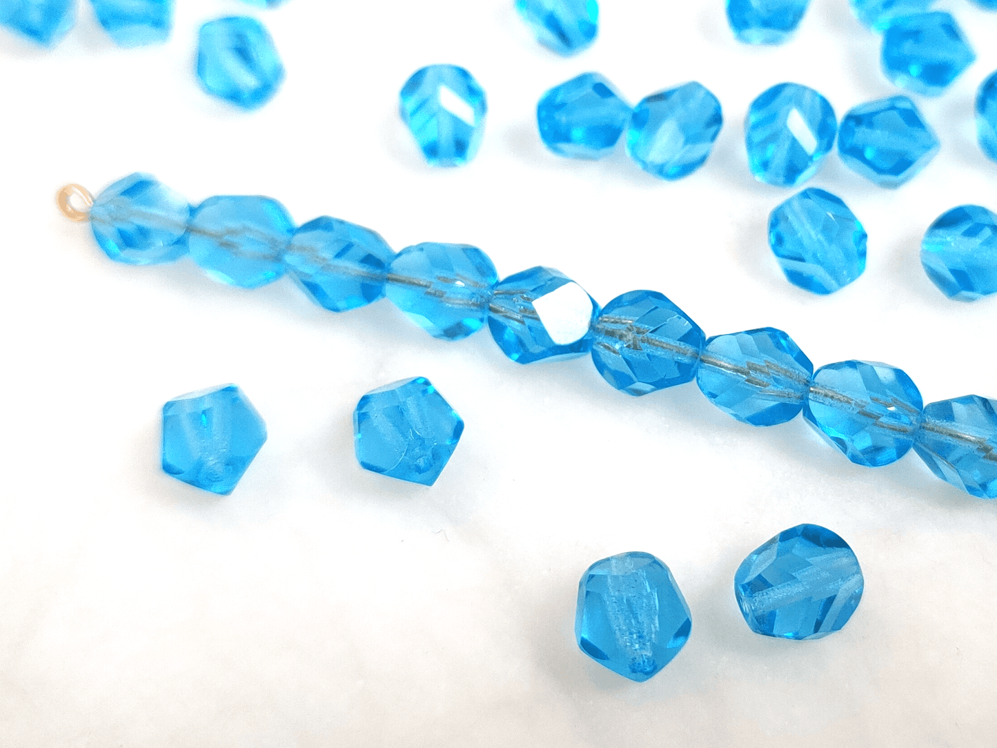 Facettierte Nuggets 8x6mm - Karibikblau