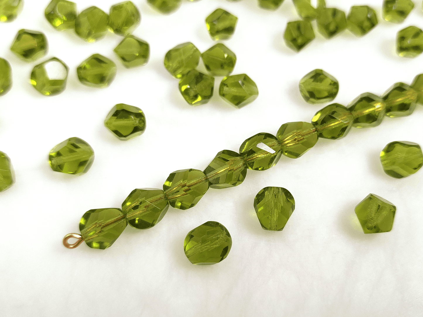 Faceted nugget beads 8x6mm - warm green