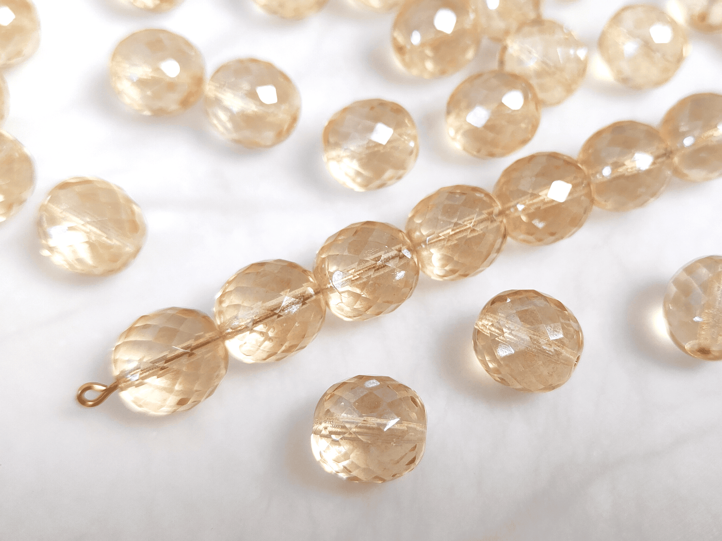12mm Glasschliffperlen - Creme