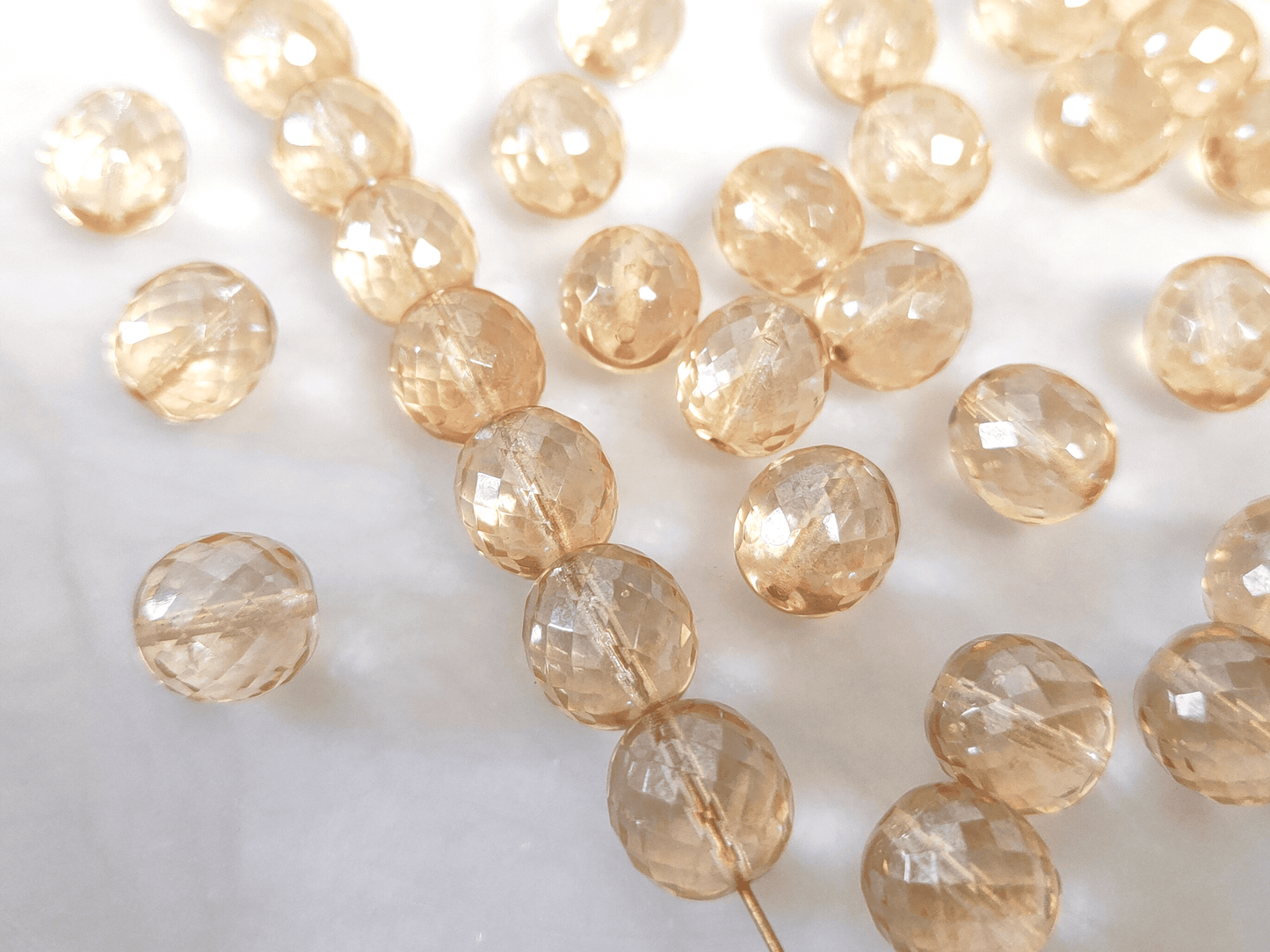 12mm Glasschliffperlen - Creme
