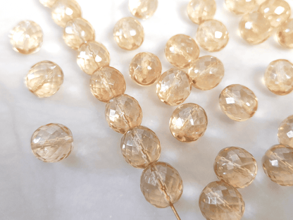 12mm Glasschliffperlen - Creme