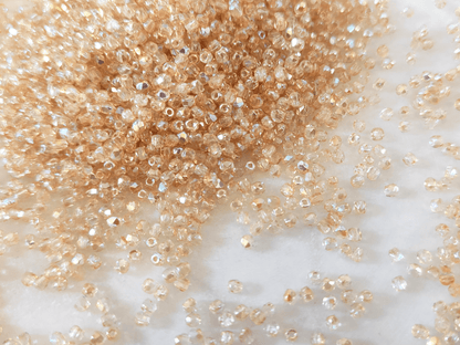 2mm fire-polished beads - beige half AB