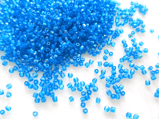 2mm fire-polished beads - tropical blue half AB