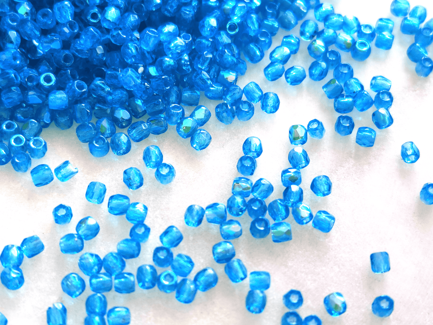 2mm fire-polished beads - tropical blue half AB
