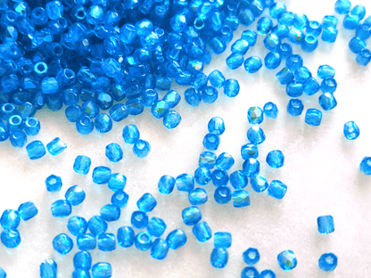 2mm fire-polished beads - tropical blue half AB