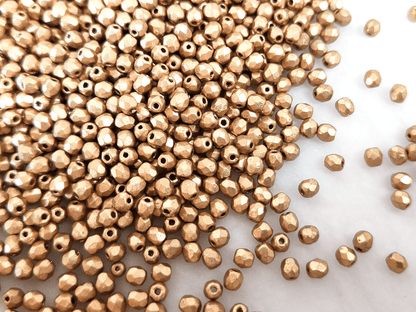 3mm fire-polished beads - matt gold