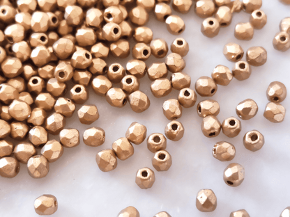 3mm fire-polished beads - matt gold