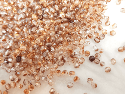 3mm Glasschliffperlen - Farblos & Rotbraun