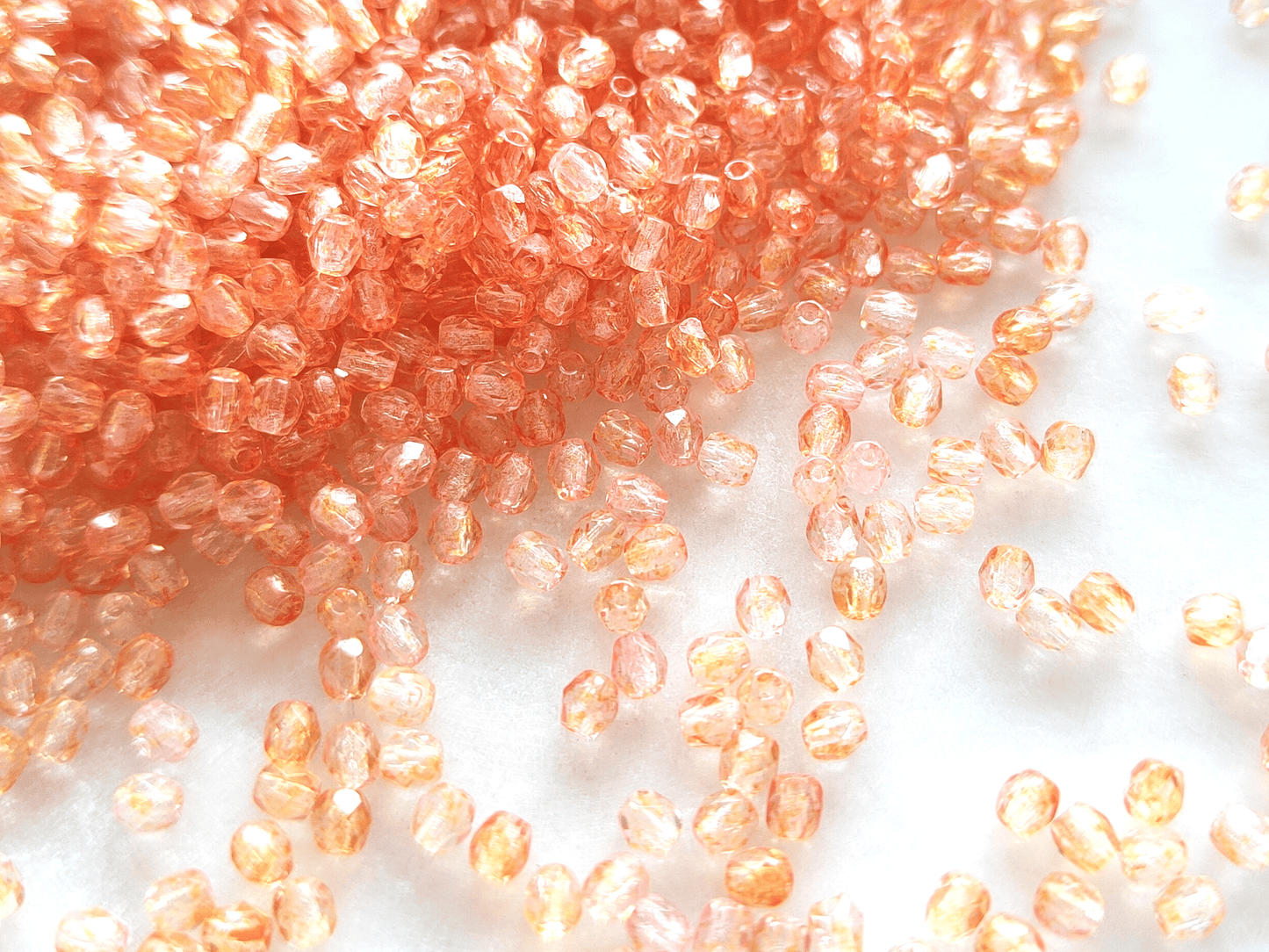 3mm Glasschliffperlen - ombre Farblos & Orange
