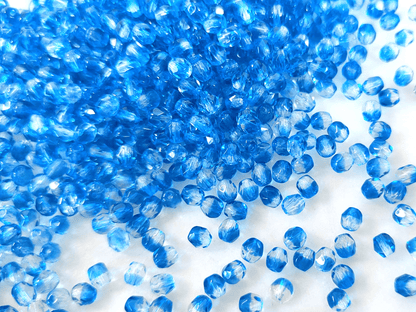 4mm Glasschliffperlen - Farblos & Blau