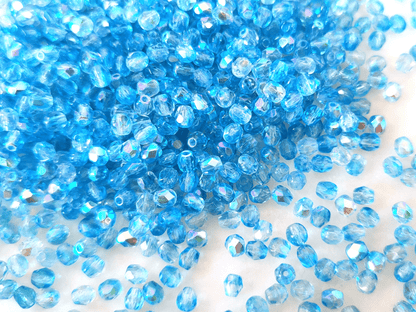 4mm Glasschliffperlen - ombre Blau AB