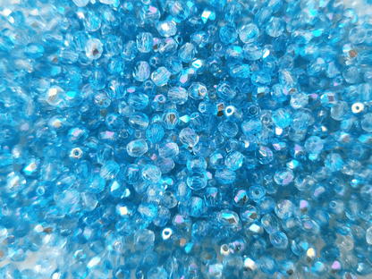 4mm Glasschliffperlen - ombre Blau AB