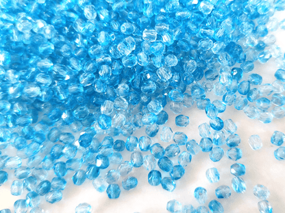 4mm Glasschliffperlen - Farblos & Karibikblau