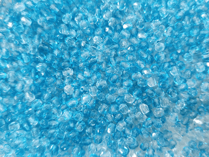 4mm Glasschliffperlen - Farblos & Karibikblau