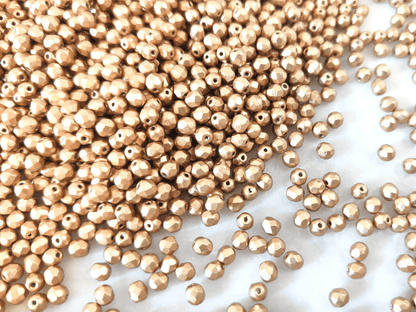 4mm fire-polished beads - matt gold
