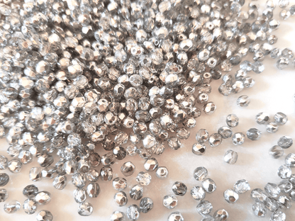 4mm fire-polished beads - colorless & dark silver