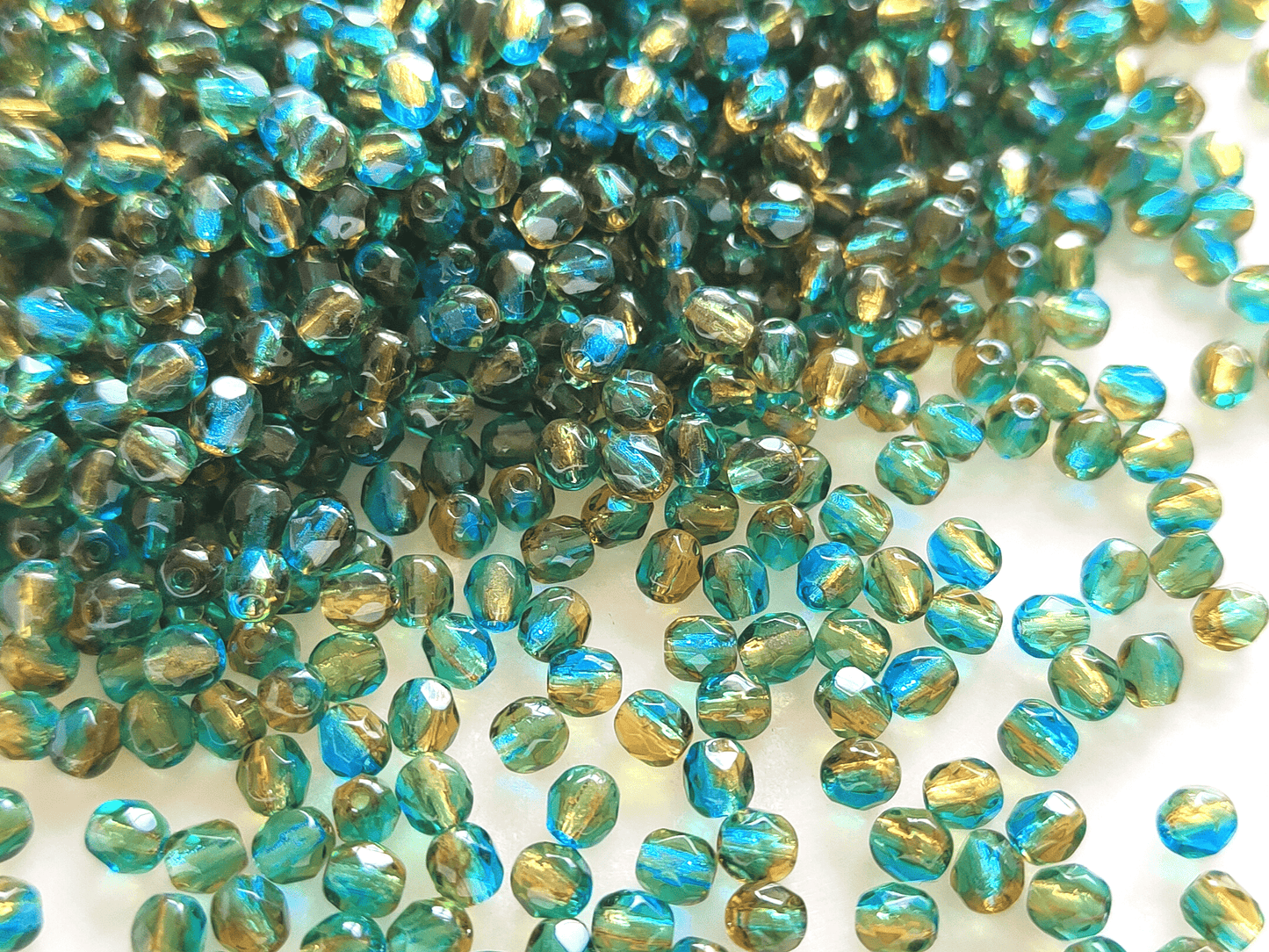 4mm Glasschliffperlen - ombre Türkis & Orange