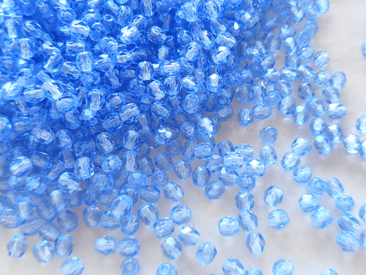 4mm Glasschliffperlen - kaltes medium Blau