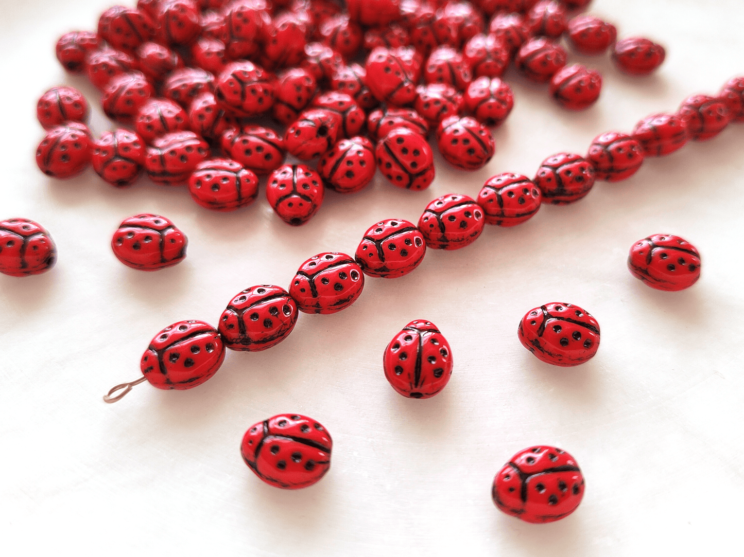 Lady bug beads 10x7mm - red & black