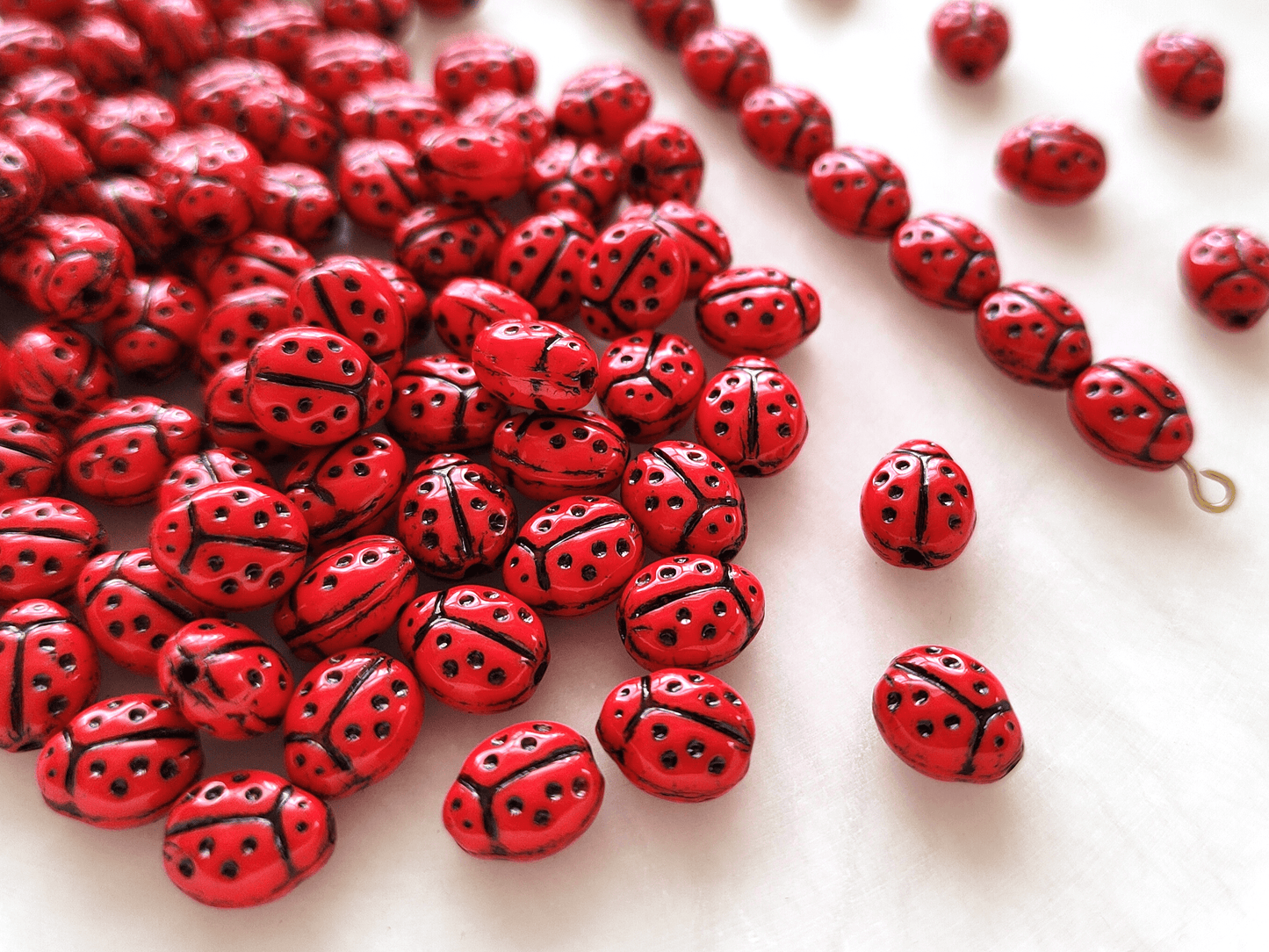 Lady bug beads 10x7mm - red & black