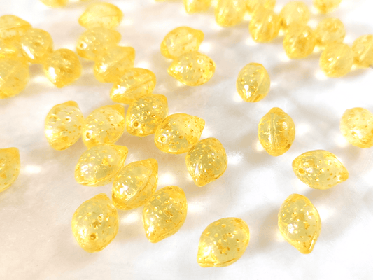 Lemon beads 10x14mm - yellow glitter