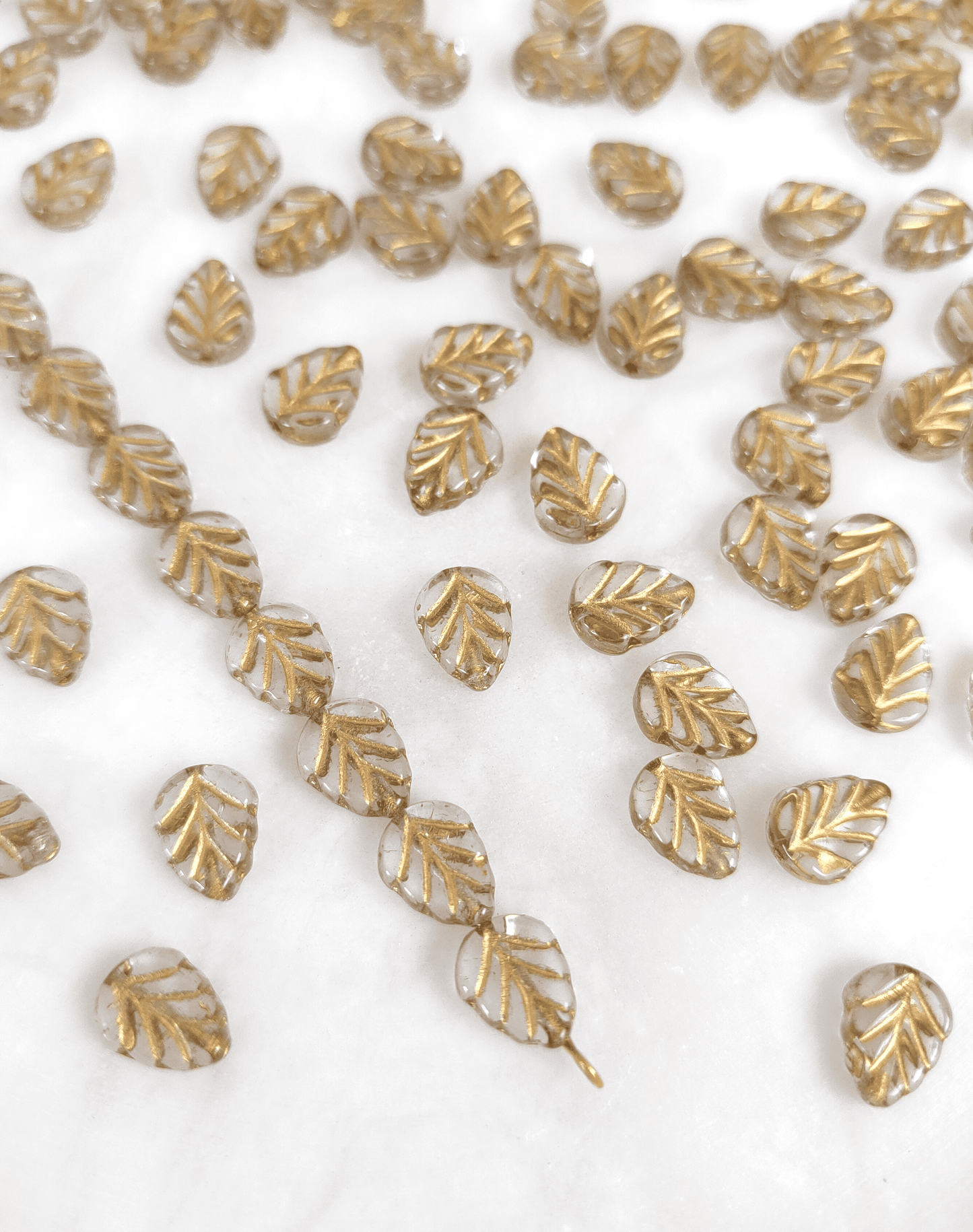 Mint leaf beads 10mm - colorless & gold