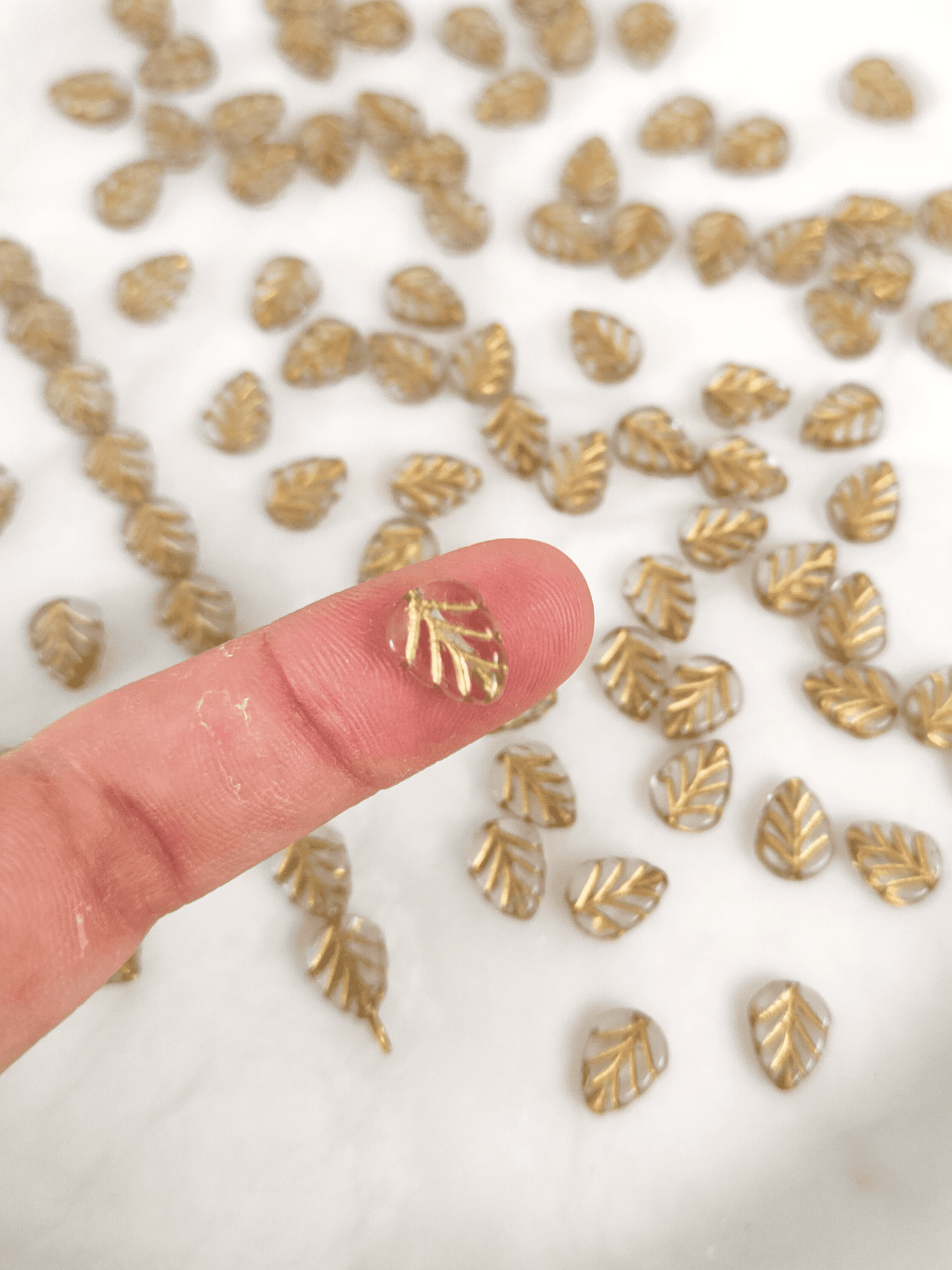 Mint leaf beads 10mm - colorless & gold